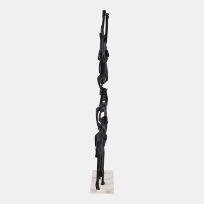 Scultura di uomini che camminano