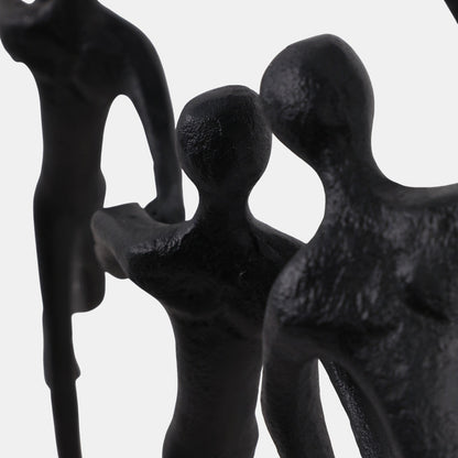 Scultura di uomini che camminano