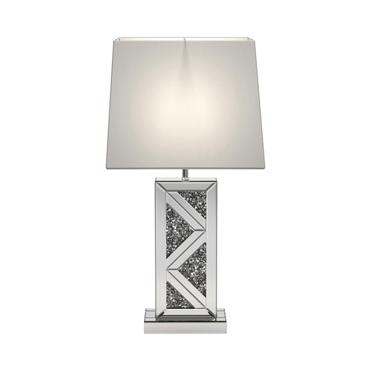 Lampada da tavolo con base geometrica